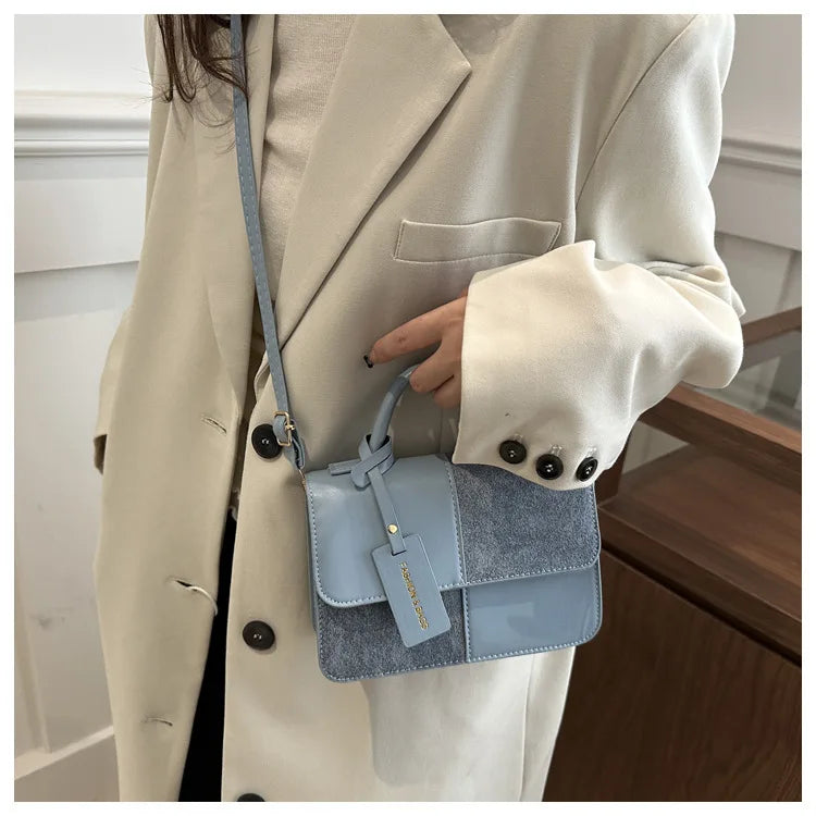 Sac à main femme géométrique avec bandoulière élégante, parfait pour un style quotidien et moderne.