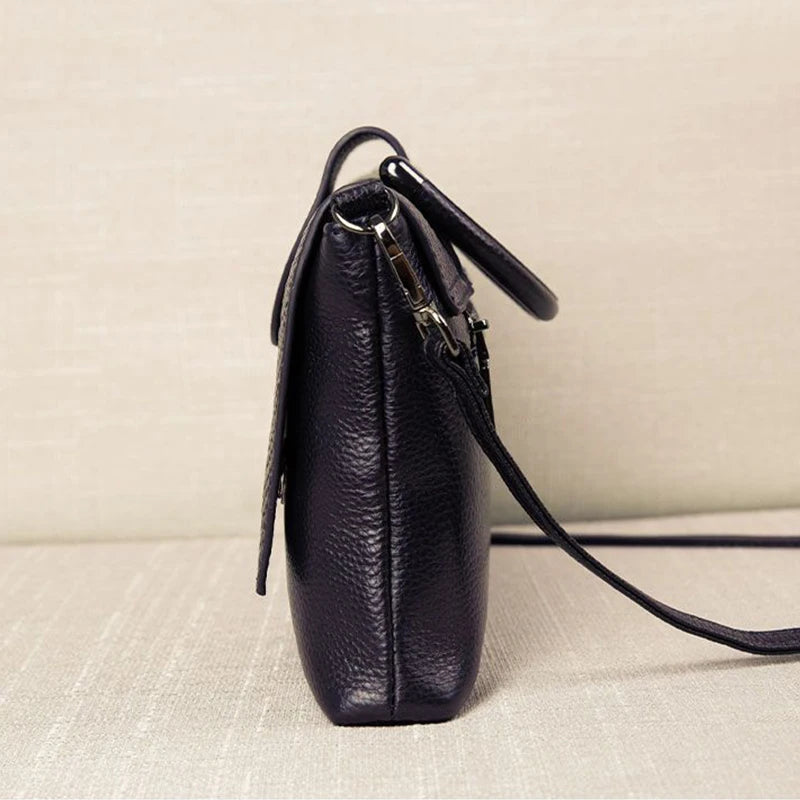 Sac à main femme en cuir PU souple avec bandoulière, sac à épaule élégant, finition luxe, couleur noire.