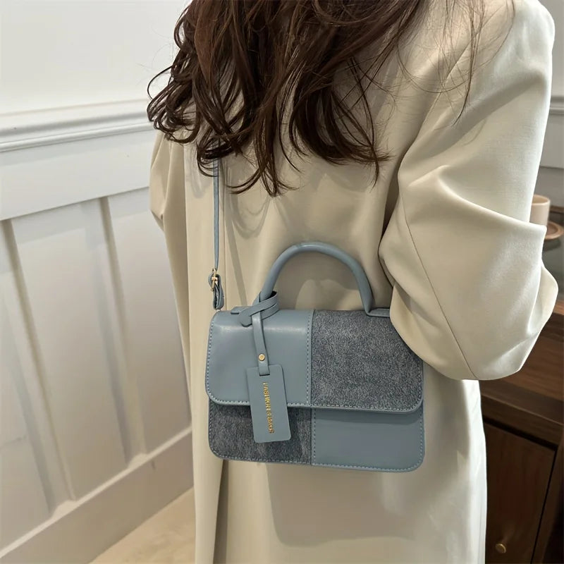 Sac à main femme géométrique avec bandoulière élégante, design moderne pour un style quotidien sophistiqué.