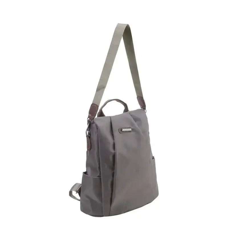 Sac à dos femme multifonction avec bandoulière amovible, style casual tendance, sac à dos pratique et moderne.