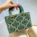 Sac bandoulière femme en strass et diamants, pochette soirée avec chaîne luxe, design élégant et brillant.