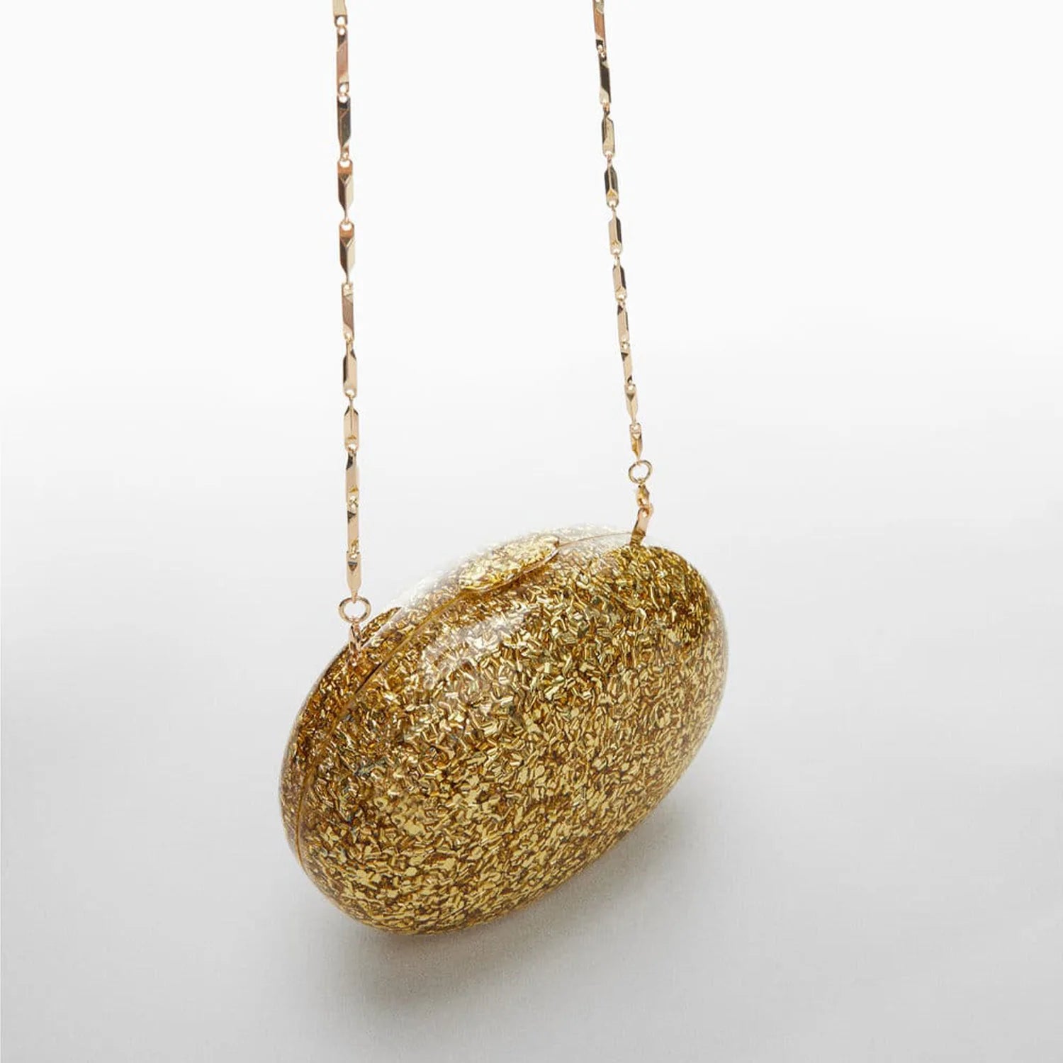 Pochette de soirée coquillage léopard avec paillettes, sac élégant pour mariage et fête, luxe et style sophistiqué.