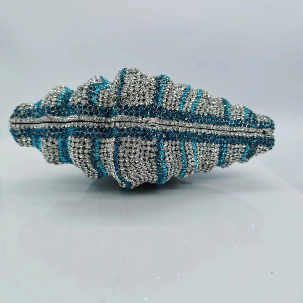 Pochette de soirée en strass et coquillage, sac de mariage luxe pour femme, design élégant et brillant.