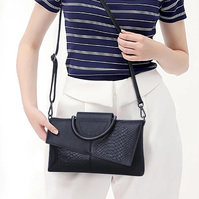 Sac à main femme en cuir PU souple, luxe, avec bandoulière et poignée épaule, design élégant et moderne.