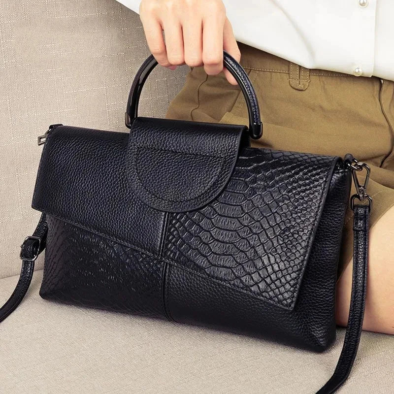 Sac à main femme en cuir PU souple avec bandoulière, sac à épaule de luxe, style élégant et moderne.