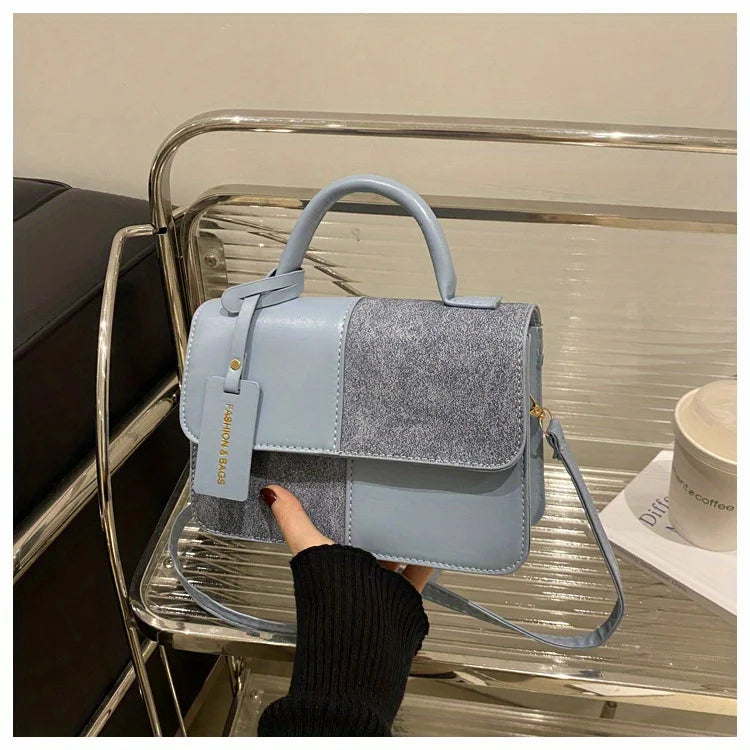 Sac à main femme géométrique avec bandoulière élégante, design tendance pour un style quotidien mode.