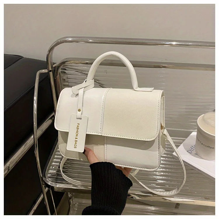 Sac à main femme géométrique avec bandoulière élégante, idéal pour un style quotidien sophistiqué et mode.