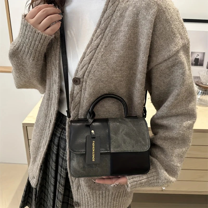 Sac à main femme géométrique avec bandoulière élégante, design moderne pour un style quotidien sophistiqué.