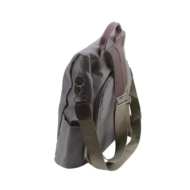Sac à dos femme multifonction avec bandoulière amovible, style casual tendance, sac à dos pratique et moderne.