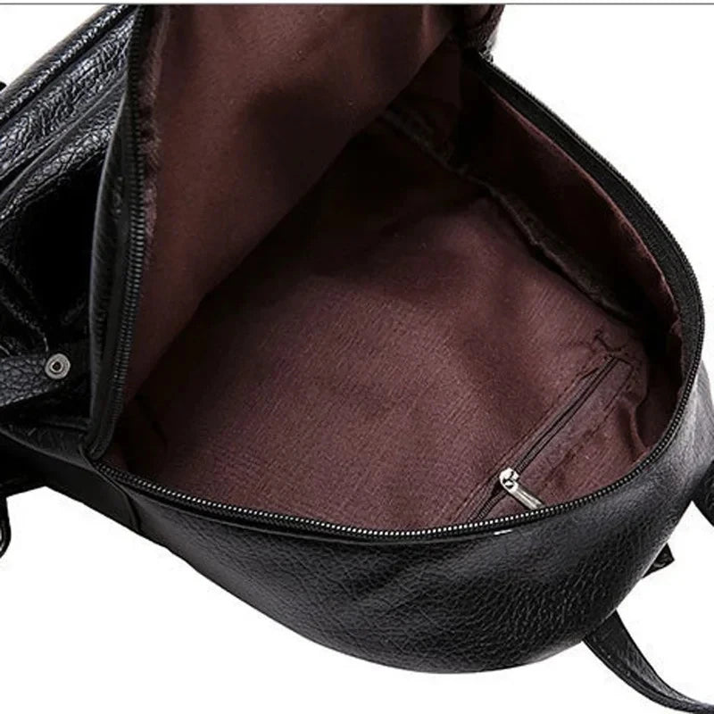 Mini sac à dos homme noir en canvas, bandoulière sport pour voyage ou école, style pratique et tendance.