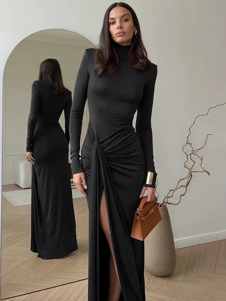Robe maxi moulante badassmood.com avec col roulé, fendue à la cuisse, manches longues et style drapé bandage.