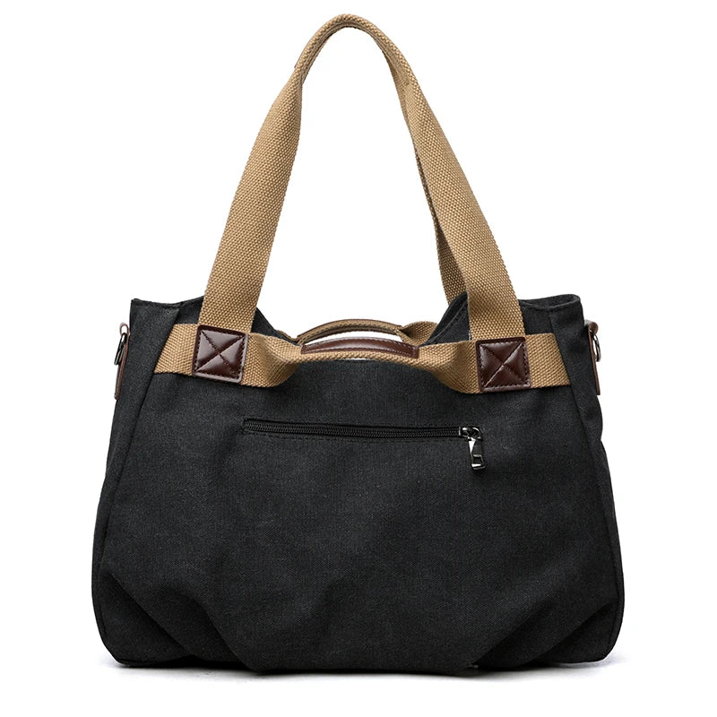 Sac à main femme en toile canvas avec plusieurs poches, grand容量, et 3 modes de port, style pratique et tendance.