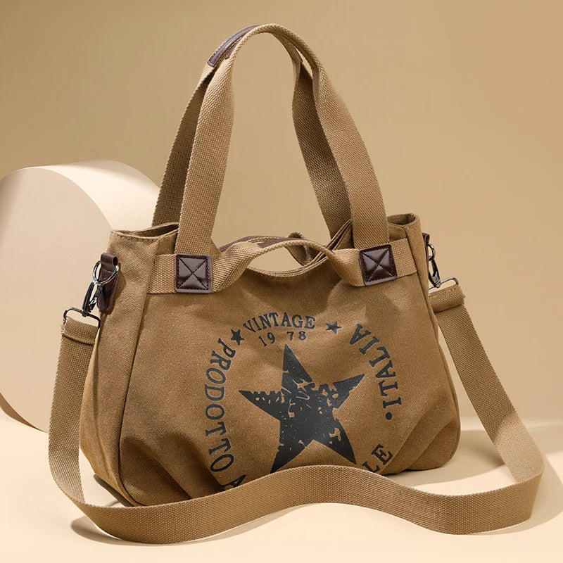 Sac à main femme en toile canvas avec plusieurs poches et trois options de port, grand volume, style pratique et tendance.