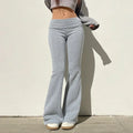 Pantalon flare Y2K taille basse, coupe bootcut slim, style casual sexy pour femme, image de pantalon noir.