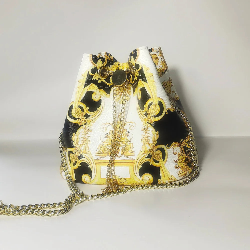 Sac bucket femme grande capacité avec chaîne dorée et bandoulière, disponible en 12 coloris, sac à main tendance.