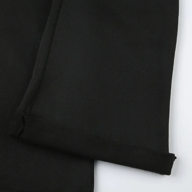 Pantalon flare Y2K taille basse, bootcut slim casual pour femme, design tendance 2024, couleur noire, style sexy et décontracté.