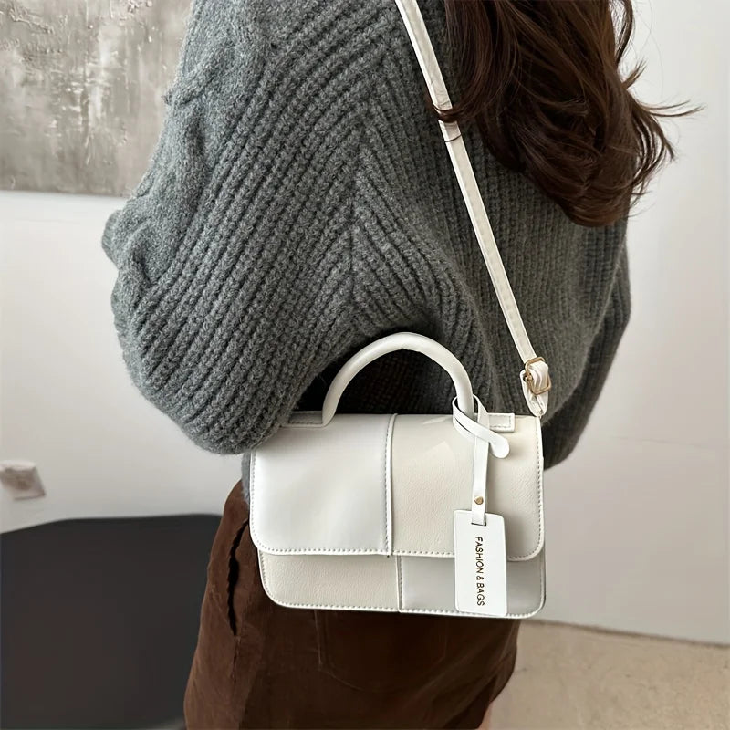 Sac à main femme géométrique avec bandoulière élégante, idéal pour un style quotidien moderne et tendance.