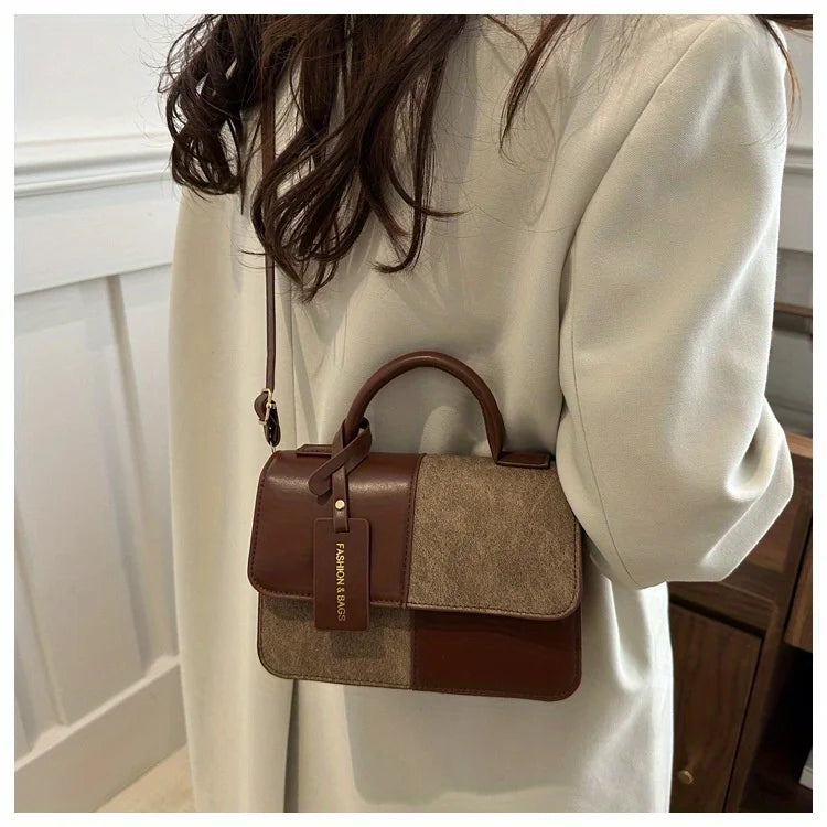 Sac à main femme géométrique avec bandoulière élégante, design moderne et tendance pour un style quotidien sophistiqué.