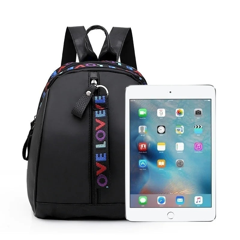 Mini sac à dos homme noir en toile avec bandoulière sport, idéal pour voyage et école, par Badassmood.