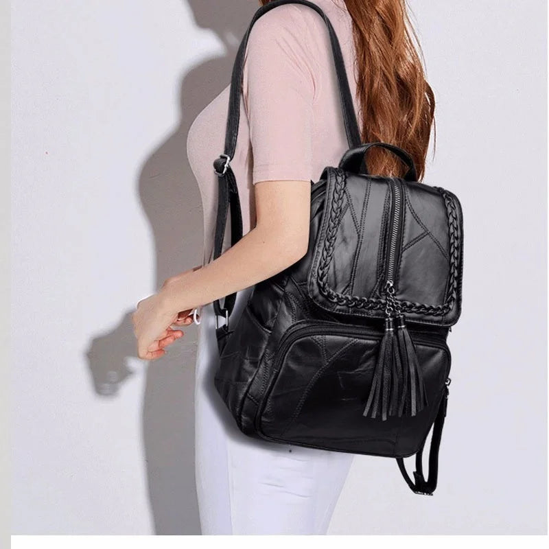 Mini sac à dos homme noir en canvas avec bandoulière sport, idéal pour voyage, école ou usage quotidien.